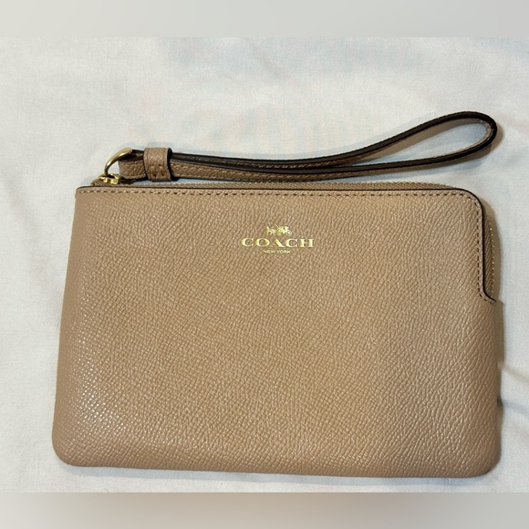 Coach Handbags - Coach Tan Corner Zip Wristlet